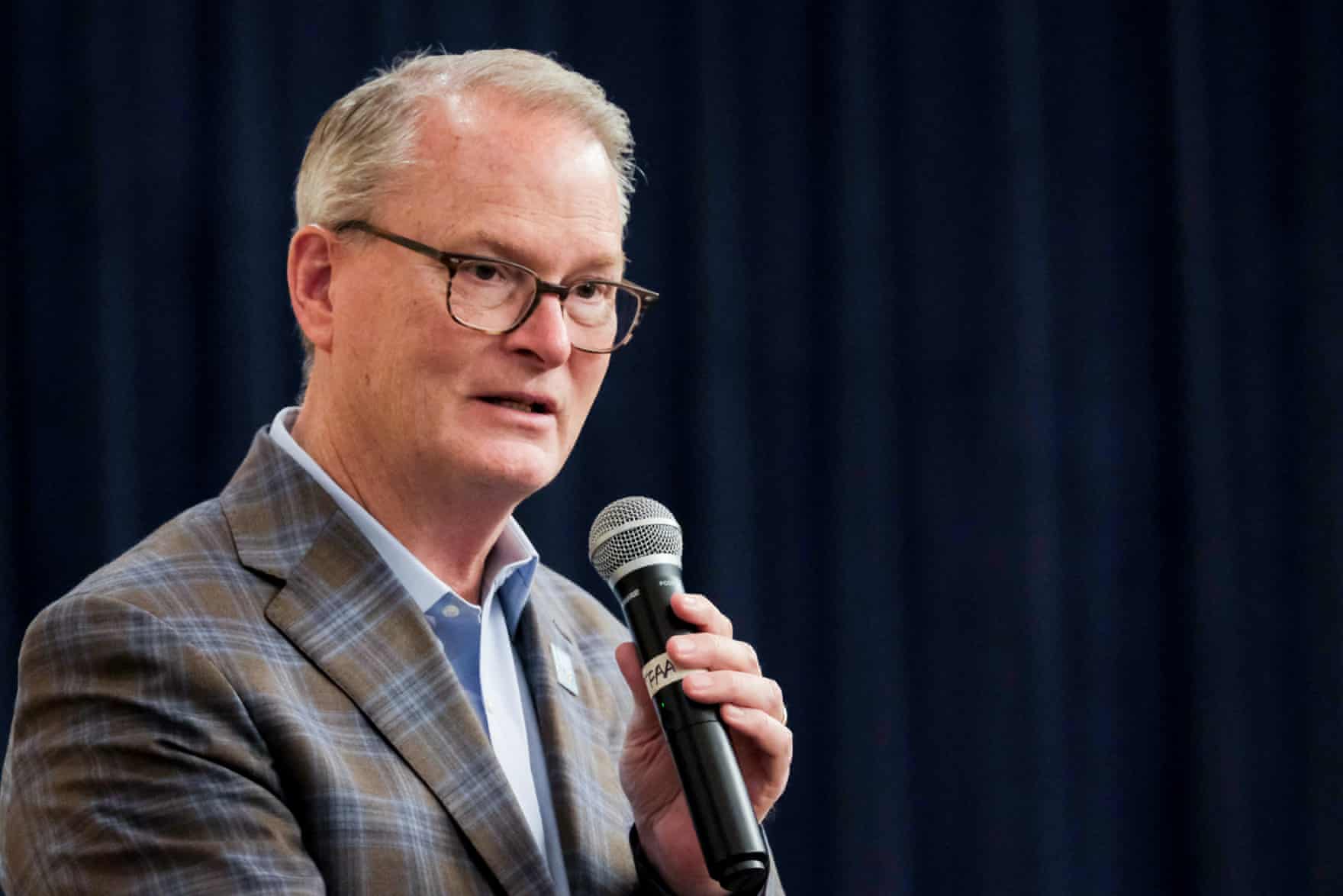 a man holding a microphone
