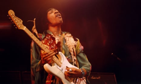 Jimi Hendrix plays a white Fender Stratocaster.