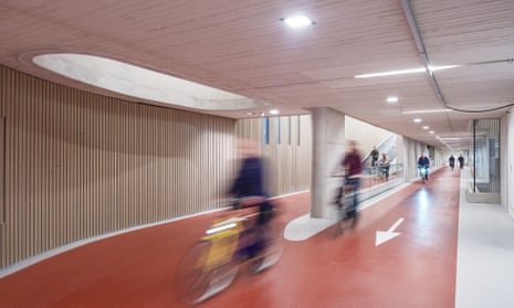 People cycle through Utrecht's multi-storey bike park
