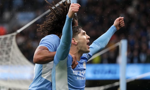 John Stones celebrates after putting Manchester City 2-1 ahead.