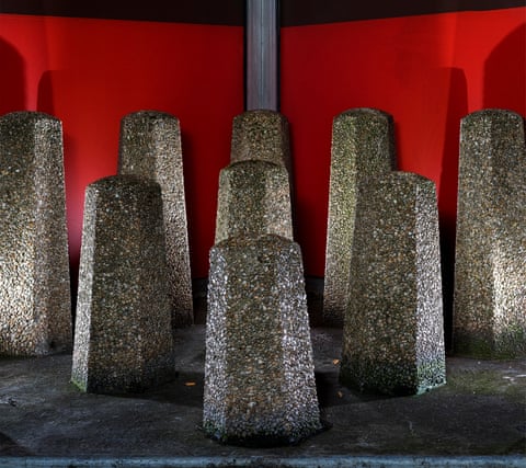 Bollards in a covered corner next to the entrance of a Carrefour supermarket at the Boulevard de Clichy.