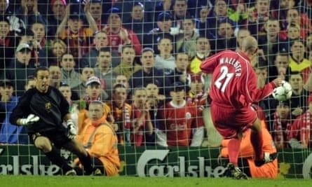 Future Liverpool goalkeeper Pepe Reina can only look on as McAllister seals Liverpool’s victory over Barcelona in their Uefa Cup semi-final, second leg tie at Anfield