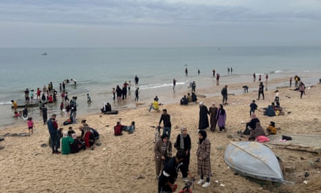 Some Palestinians have spent time on the beach in Deir al-Balah during the temporary truce between Hamas and Israel. During the conflict some Palestinians have been forced to use seawater for bathing and washing clothes.