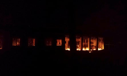 Fire is seen inside a Medecins Sans Frontieres (MSF) hospital building after an air strike in the city of Kunduz