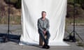Conscientious objector Peter Hathorn in Cape Town, South Africa, sitting in front of a white sheet hanging on a frame