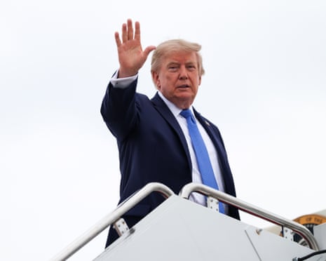 President Donald Trump waves as he boards Air Force One at Joint Base Andrews, Maryland, 14 August 2026.