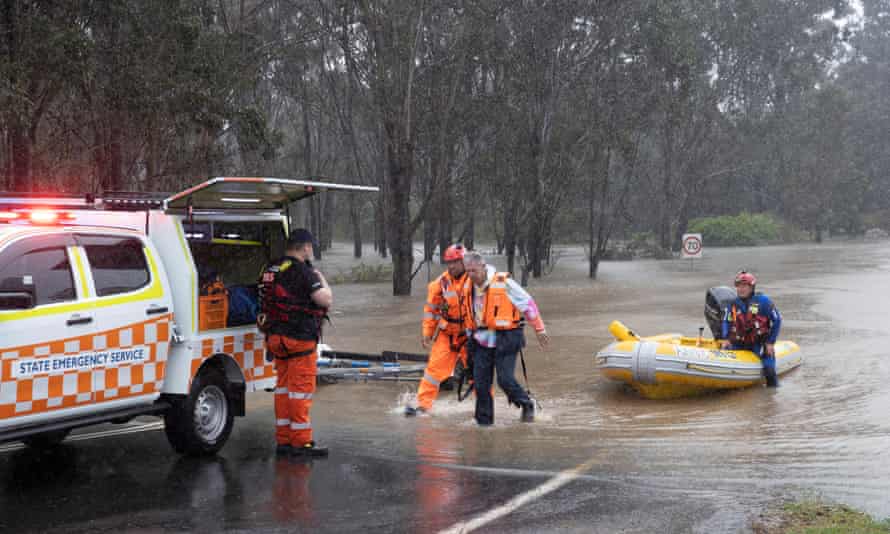 Brian Russell is rescued by SES from his flooded vehicle along blacktown Road near Richmond west of Sydney. Monday 4th July 2022. Photograph by Mike Bowers. Guardian Australia
