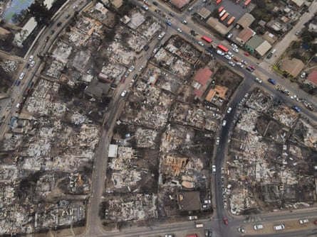 Rows of burnt housing can be seen next to housing still standing in this neighbourhood in Vina del Mar