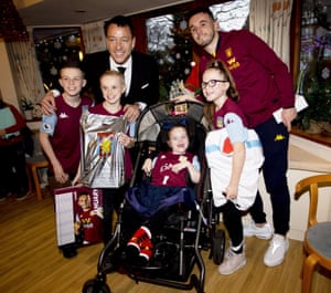 Aston Villa’s John McGinn (right) and assistant coach John Terry visit Acorns Hospice in December last year.
