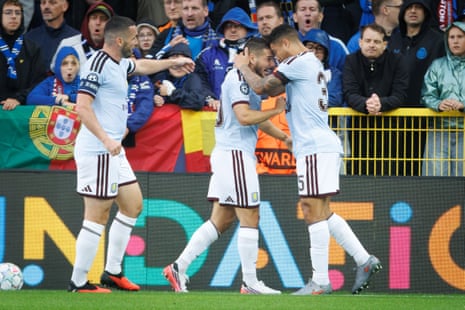 Aston Villa's Emi Buendia (centre) celebrates with Joao Gomes (right) after scoring their side's second goal.