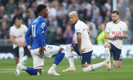 Richarlison takes a knee before Tottenham’s game against Everton on Saturday, along with the players from both teams.