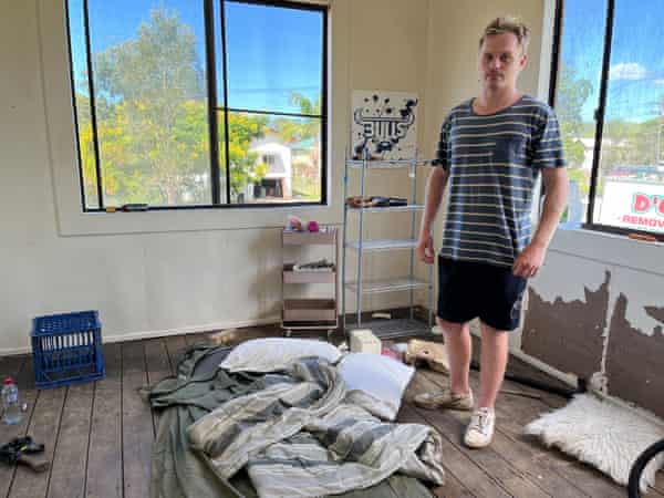 Ryan Lee stands next to the swag he is sleeping on at the family home