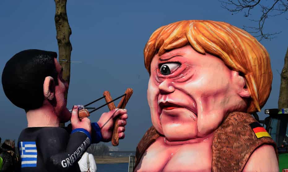Figures depicting Greek PM Alexis Tsipras and German Chancellor Angela Merkel