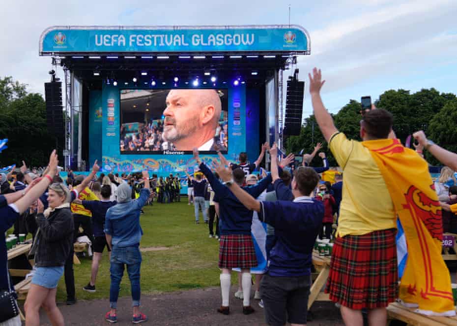 Fans at Glasgow’s official Fan Zone cheer when manager Steve Clarke’s appears on the giant screen during the match against Croatia, but will the goodwill remain if his team fail to qualify for the World Cup?