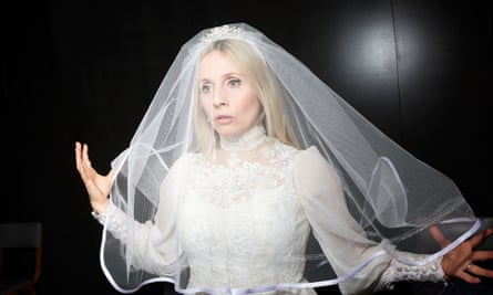Sinéad Matthews as Sylvia in a wedding dress