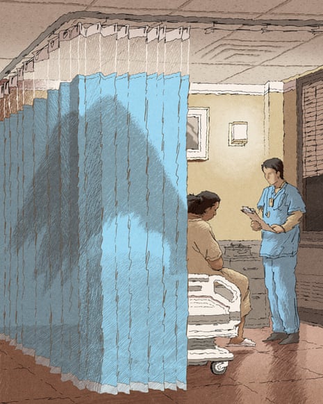 A hospital room with a blue privacy curtain pulled halfway. A woman sits on the bed. Behind the curtain is a shadow of angel wings.. A healthcare worker in blue scrubs stands nearby holding papers. responsive-image