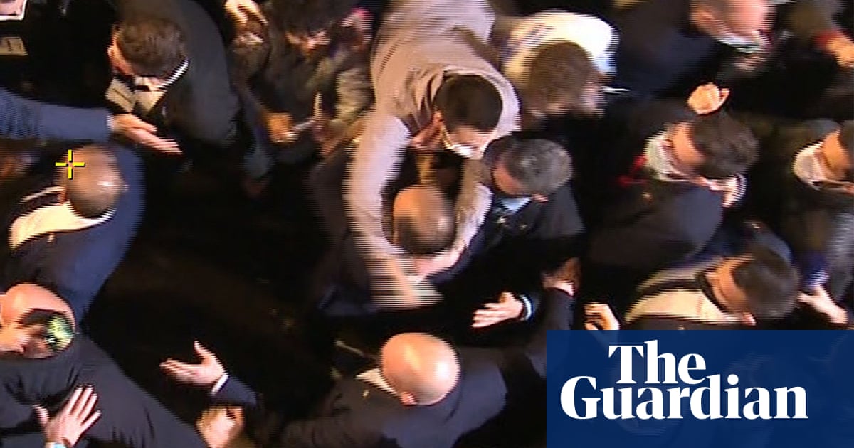 Far-right French presidential candidate put in headlock by protester at rally