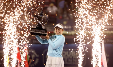 Jelena Ostapenko of Latvia poses with her championship trophy after winning the Dubai Duty Free Tennis Championships in February.