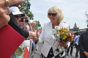 Camilla is greeted by flag-waving children in Tanunda, in the Barossa Valley.