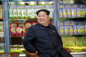 Kim Jong Un smiles during a visit to inspect the Pyongyang Children’s Foodstuff Factory