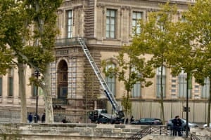 A long ladder leads from a vehicle up to one of the balconies of the Louvre