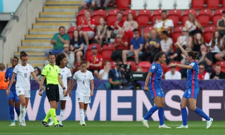 Delphine Cascarino celebrates scoring France’s third goal with Charlotte Bilbault
