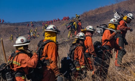 Firefighters worked to contain the fast moving Easy fire on 31 October 2019.