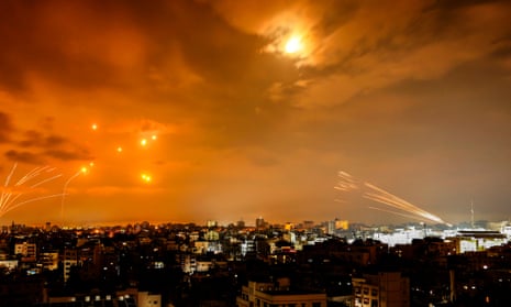 A wide shot of rockets being intercepted