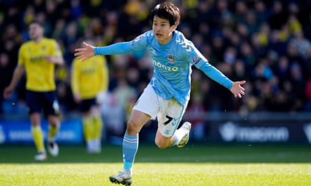 Tatsuhiro Sakamoto celebrates his winning goal against Oxford
