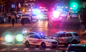 Police outside Comet Ping Pong, a pizza restaurant that was the subject of a fake news story claiming it was the centre of a child sex ring orchestrated by Hillary Clinton, after a man with an assault rifle entered the restaurant.
