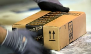 An employee prepares order at Amazon’s San Bernardino Fulfillment Center.