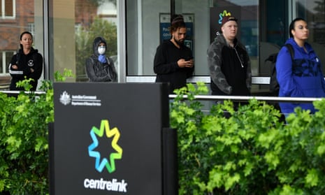 People queue outside a Centrelink office in Sydney