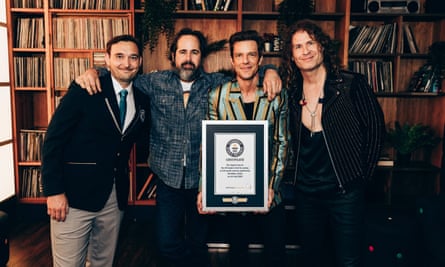 Rock band The Killers receive a certificate from the Guinness World Records
