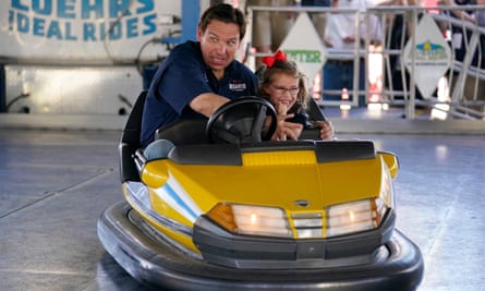 Ron DeSantis drives a bumper car as his daughter Madison laughs at the Iowa State Fair in Des Moines, Iowa, this month.