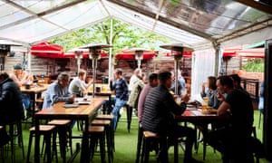 Patrons enjoying drinks at Assembly Bar in the Canberra suburb of Braddon in October. The ACT will ease restrictions further on Friday, with no density limits for outdoor spaces within businesses.