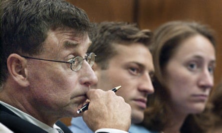 Michael Peterson, left, alongside his son, Todd Peterson, and adopted daughter, Margaret Ratliff, listen to a hearing after trial.