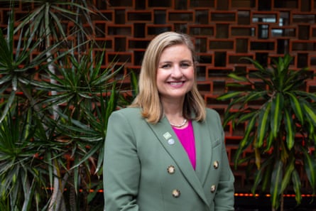 A middle-aged white woman in a jacket