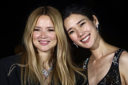 Virginie Efira, left, and Tao Okamoto, winners of the best actress prize for All of a Sudden.