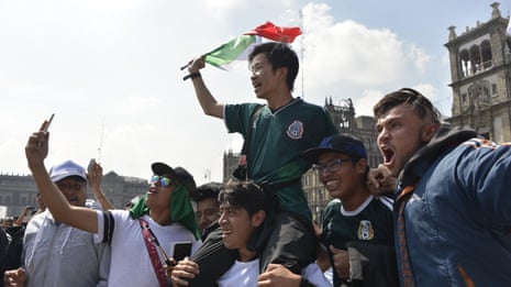 South Korean fans mobbed by Mexicans after Germany's World Cup exit – video