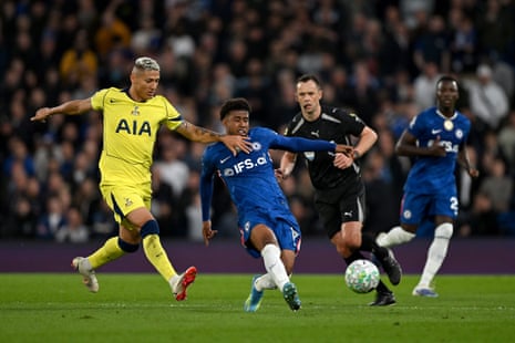 Andrey Santos of Chelsea passes the ball while under pressure from Richarlison