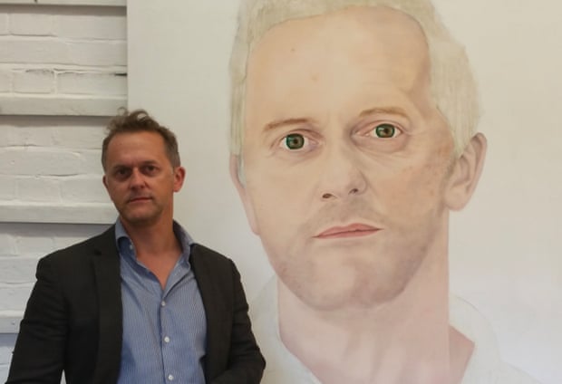 Mark Rice-Oxley with Andrea Tyrimos’s portrait of him.