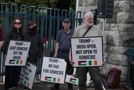 Protesters holding signs reading 'Trump - Irish Open. Not open to genocide'.