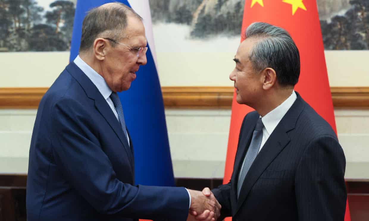 The Russian foreign minister, Sergei Lavrov, met his Chinese counterpart, Wang Yi, in Beijing on Monday. Photograph: Russian foreign ministry/AFP/Getty Images