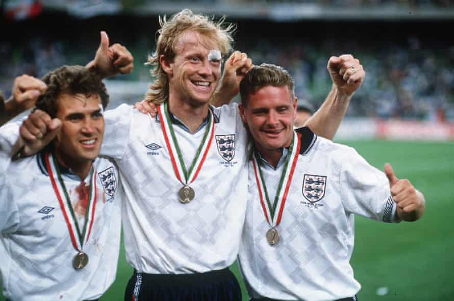 Dorigo, Mark Wright and Paul Gascoigne celebrate with their fourth-place medals at the 1990 World Cup.
