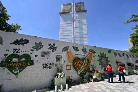 The memorial wall at Grenfell Tower