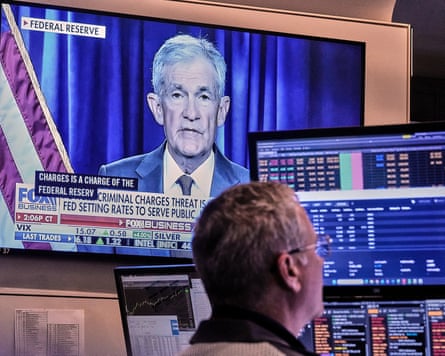A video of Federal Reserve chair, Jerome Powell, plays on a screen on the floor of the New York Stock Exchange on 12 January.