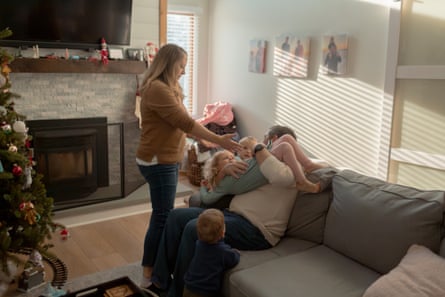 a family spends time in their living room