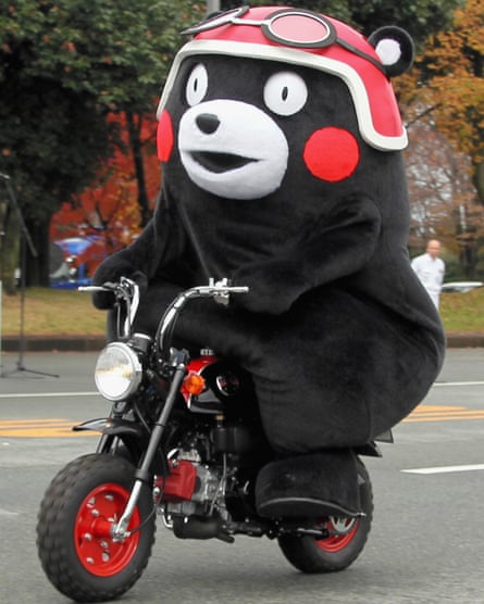 Kumamoto prefecture’s official mascot Kumamon rides the Kumamon-themed scooter made by Honda.