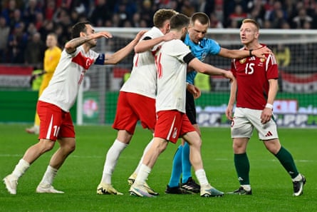 Hungary’s Laszlo Kleinheisler has a difference of opinion with a number of Turkey players during their friendly in Budapest during March 2024.