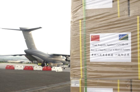 China-provided anti-Covid supplies in crates on a runway